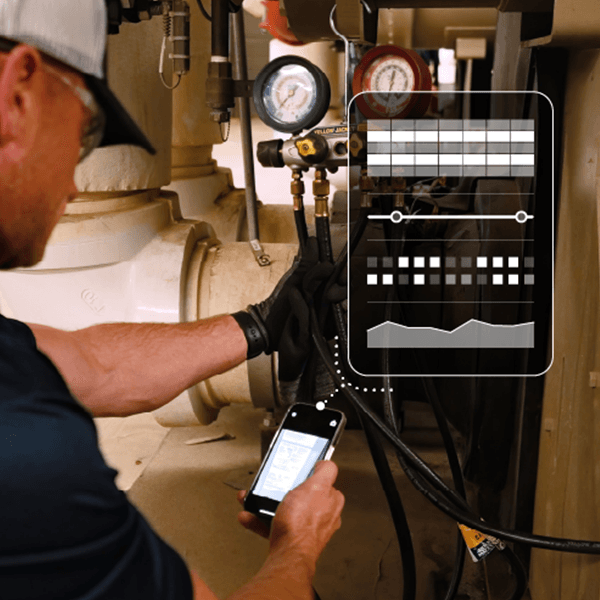 man using XOi technology at a jobsite